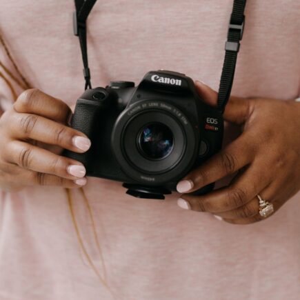 Tiffany holding a camera