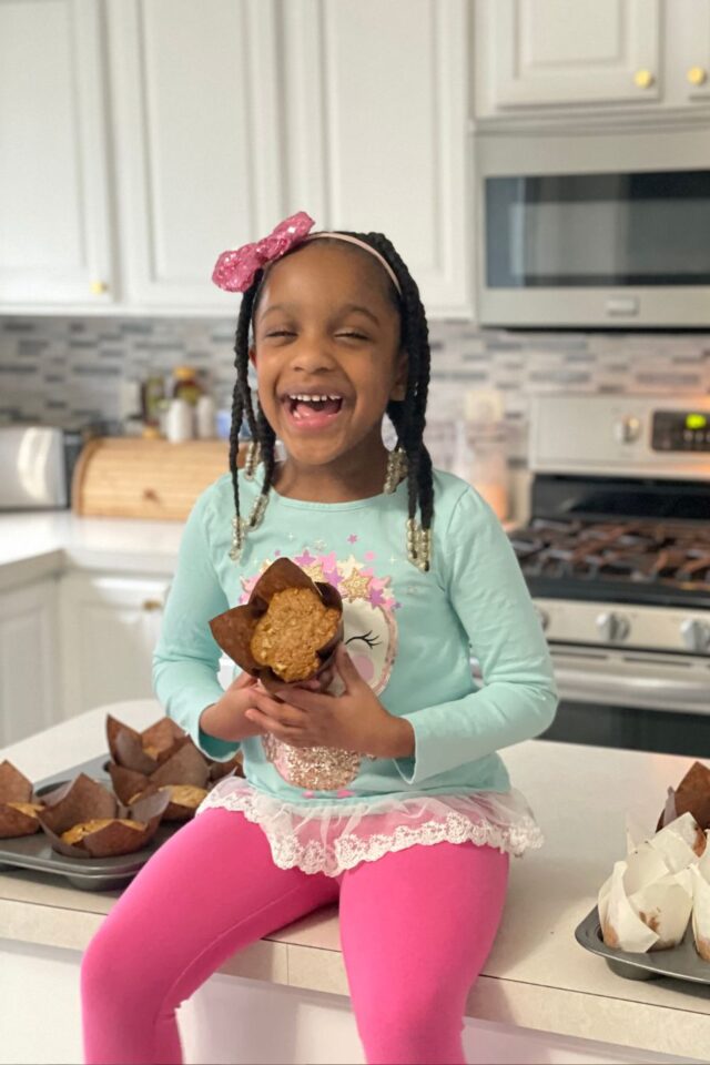 Annalise after baking her world famous applesauce muffins.