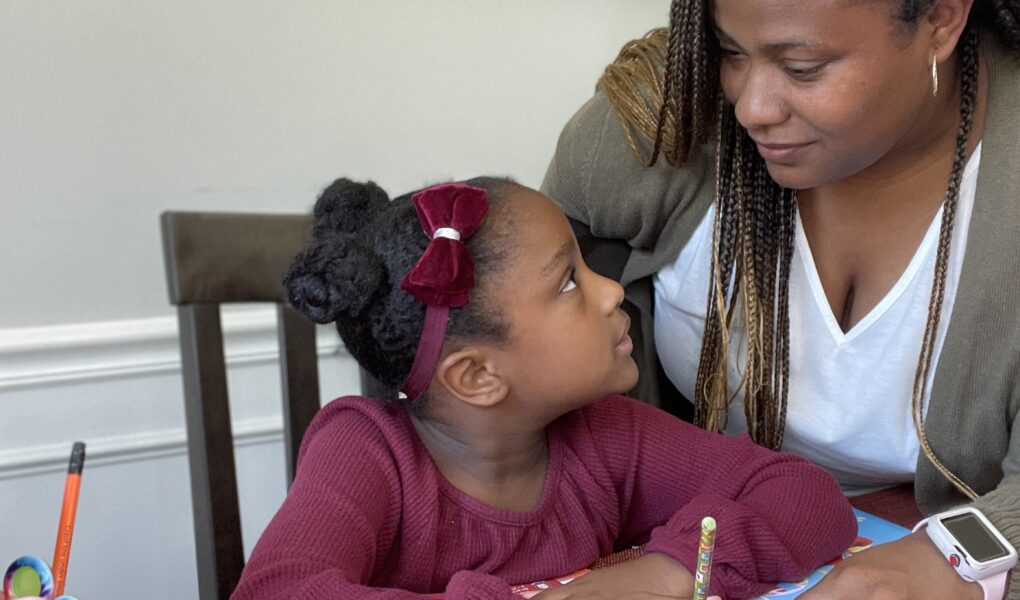 Tiffany helping Annalise with her homework