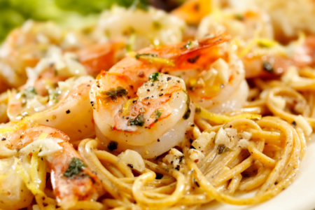 Lemon garlic butter shrimp over pasta is a quick and healthy weeknight dinner idea