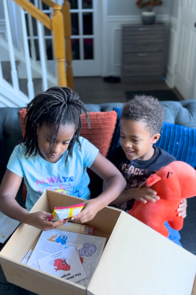 Annalise and Deuce opening the subscription box